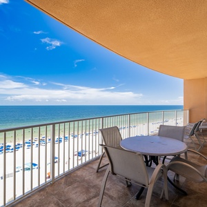 Enjoy the fresh gulf air on the spacious balcony, overlooking the beach and tranquil waters