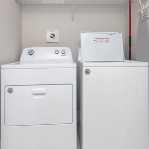 Effortlessly refresh your wardrobe with an in-unit laundry setup, perfect for post-beach adventures