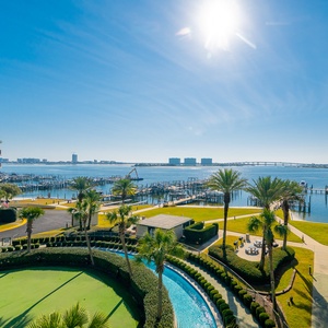 Bask in the warm sun on the balcony, enjoying sweeping bay views and the serenity of coastal living