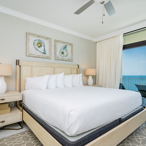 Experience restful nights with the sights and sounds of the coast from this relaxing master suite