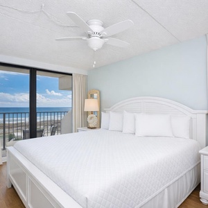 Drift off to sleep as gentle breezes from your balcony bring the soothing sounds of the coast into this king master suite
