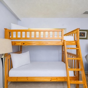 Twin over twin bunk area invites restful nights and cozy moments after a day exploring the coast
