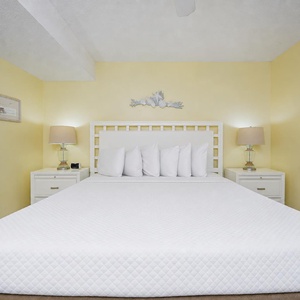 Calm yellow walls surround your king suite where gentle lamp light sets a restful mood