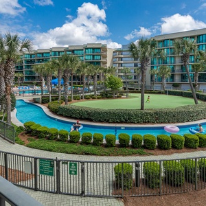 Discover the pool area with a refreshing lazy river and thrilling waterslide, just steps from the bay