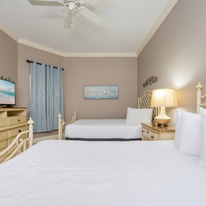 Unwind in this guest suite with two queen beds and watch a good movie for a peaceful night