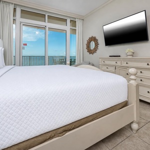 Drift into a restful sleep in the king master suite, waking to breathtaking coast views just outside your balcony