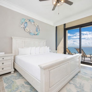 Rest peacefully in this king master suite with the sights and sounds of the coast from your balcony