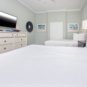 Unwind in this queen guest suite and stream your favorite shows or enjoy a good movie after a beach day