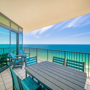 Unwind on your balcony, surrounded by vibrant colors and stunning views of the coast