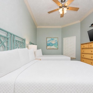 Unwind in this queen guest suite and stream your favorite shows or enjoy a good movie after a beach day