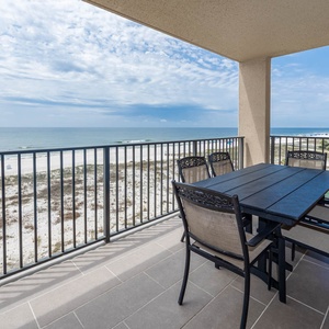 Enjoy meals or drinks at the outdoor dining table while taking in the serene coastal views
