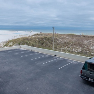 Enjoy easy access to the pristine beach and stunning views from this first-floor balcony