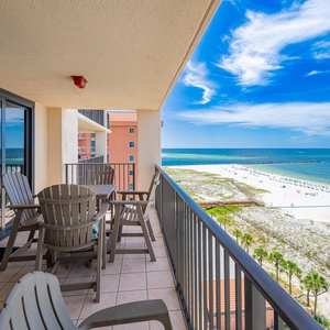 Relax on the balcony while taking in breathtaking views of the water and beach below