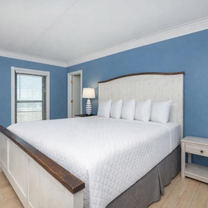 Drift into comfort in the king master suite, where peaceful nights await in your serene beach retreat
