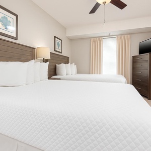 Relax on one of the cozy double beds in this guest suite and enjoy a peaceful slumber