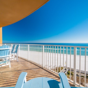 Savor the sun on this spacious balcony, where gentle breezes and breathtaking beach views invite relaxation