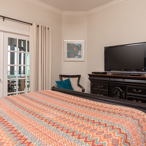 Drift into comfort in the king master suite, surrounded by serene decor, inviting restful nights