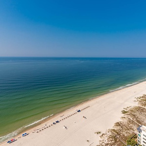 Step onto the beach to feel the warm gulf breeze and listen to long rolling waves