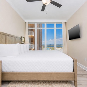Lie back on the king bed in this guest suite and admire the coastal views through tall windows