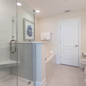 Enjoy a warm, restorative rinse in the glass shower or soak in the jetted tub in the master bath