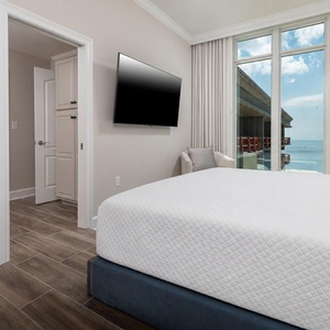 Rest in this king guest suite, watch a show on the TV, and gaze at the gulf through expansive windows