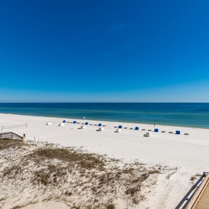 Watch the coastline stretch into the distance and the horizon meet the sky from your balcony while you soak up the sun