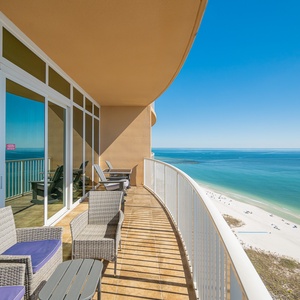 Watch the coastline stretch into the distance and the horizon meet the sky from your balcony while you soak up the sun