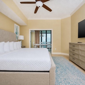 Sink into the plush, inviting king bed in the master, ready to relax and enjoy a movie after a fun day at the coast