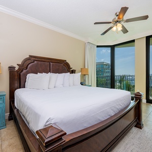 Retreat to the king master suite with cozy bedding and drift off to coastal sights and sounds of the bay