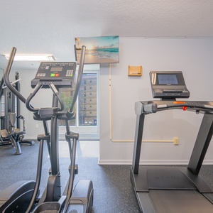 Stay active in the fitness center, equipped with modern machines for your workout needs