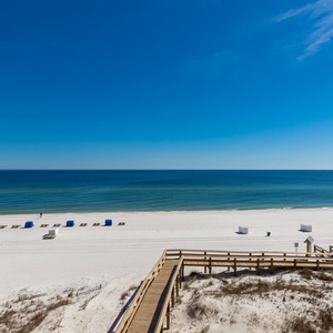 Breathe in the calming coastal air while enjoying stunning views from the spacious balcony, perfect for relaxation