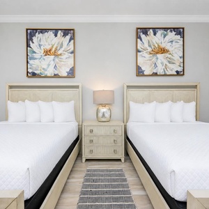 Drift off into a peaceful sleep in this queen guest room with a relaxing vibe for a restful stay