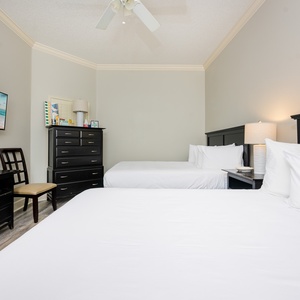 Unwind in this queen guest suite and stream your favorite shows or enjoy a good movie after a beach day