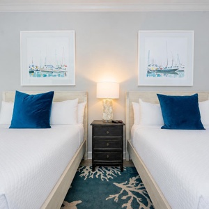 Sink into plush queen beds, enjoy restful nights, and wake up refreshed in this guest suite