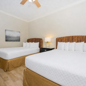 Relax on one of the cozy queen beds in this guest suite and enjoy a peaceful slumber