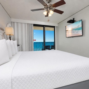 Drift into relaxation on plush king bedding while streaming your favorite shows or enjoying a good movie
