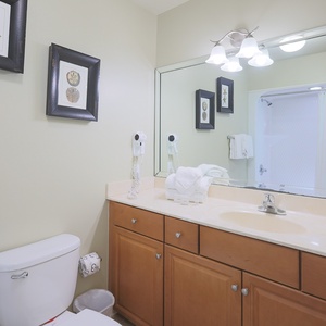 Refresh yourself in the inviting guest bath, where you'll find plush towels and thoughtful touches waiting for you