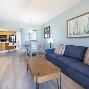 Relax on the comfortable sofa with queen sleeper while enjoying the stylish decor and open layout that invites conversation