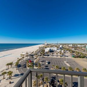 Enjoy breathtaking views of the shoreline and vibrant surroundings from your spacious balcony