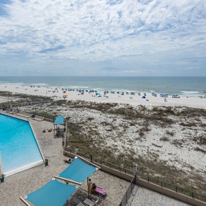 Take in the inviting pool area and enjoy easy access to the beach with lounge chairs and umbrellas for your relaxation