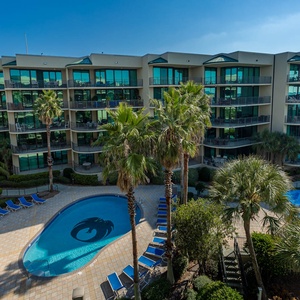 Discover the pool area with a refreshing lazy river and thrilling waterslide, just steps from the bay