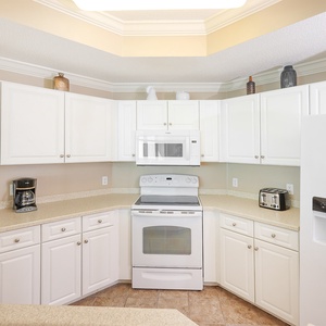 Craft delicious meals in the bright kitchen, enjoying the perfect space for family bonding and culinary creativity