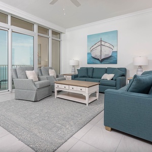 Sink into the plush sofa with a queen sleeper and listen to surf rolling in from the beach from the balcony