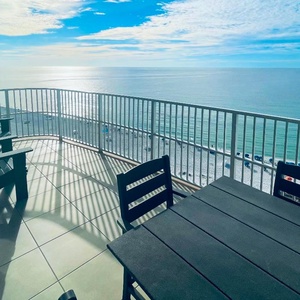 Sit in an Adirondack chair on your balcony and observe sunlight rippling across the gulf to the shore