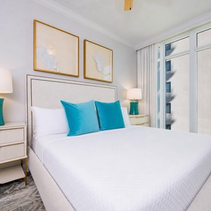 Rest comfortably in this guest room with a king bed, surrounded by calming decor, inviting you to unwind