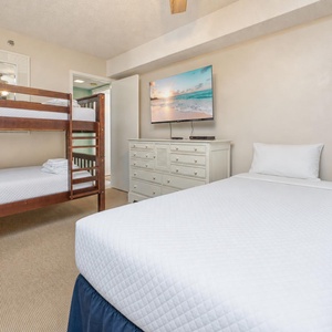 Twin and two twin bunk beds in the guest suite offer restful spots to unwind and stream your favorite shows