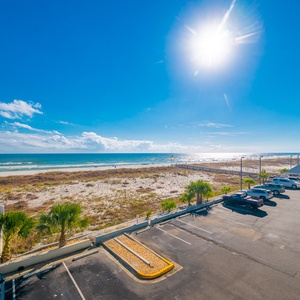 Experience bliss on your balcony as you soak in coastal views and enjoy the warmth of the sun and gentle surf sounds