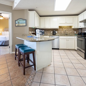 Enjoy cooking in the spacious kitchen featuring granite countertops, stainless appliances, and a convenient breakfast bar
