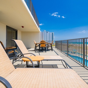 Soak up the sun in lounge chairs on your balcony while enjoying breathtaking views and the refreshing beach vibe