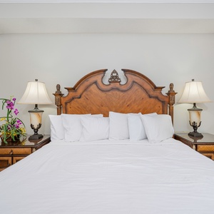 Experience tranquil nights in the plush king bed in the master, surrounded by soft linens and warm, inviting ambiance